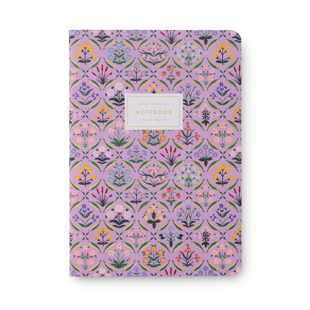 Rifle Paper Co. Estee Stitched Notebook floral print front cover in violet.
