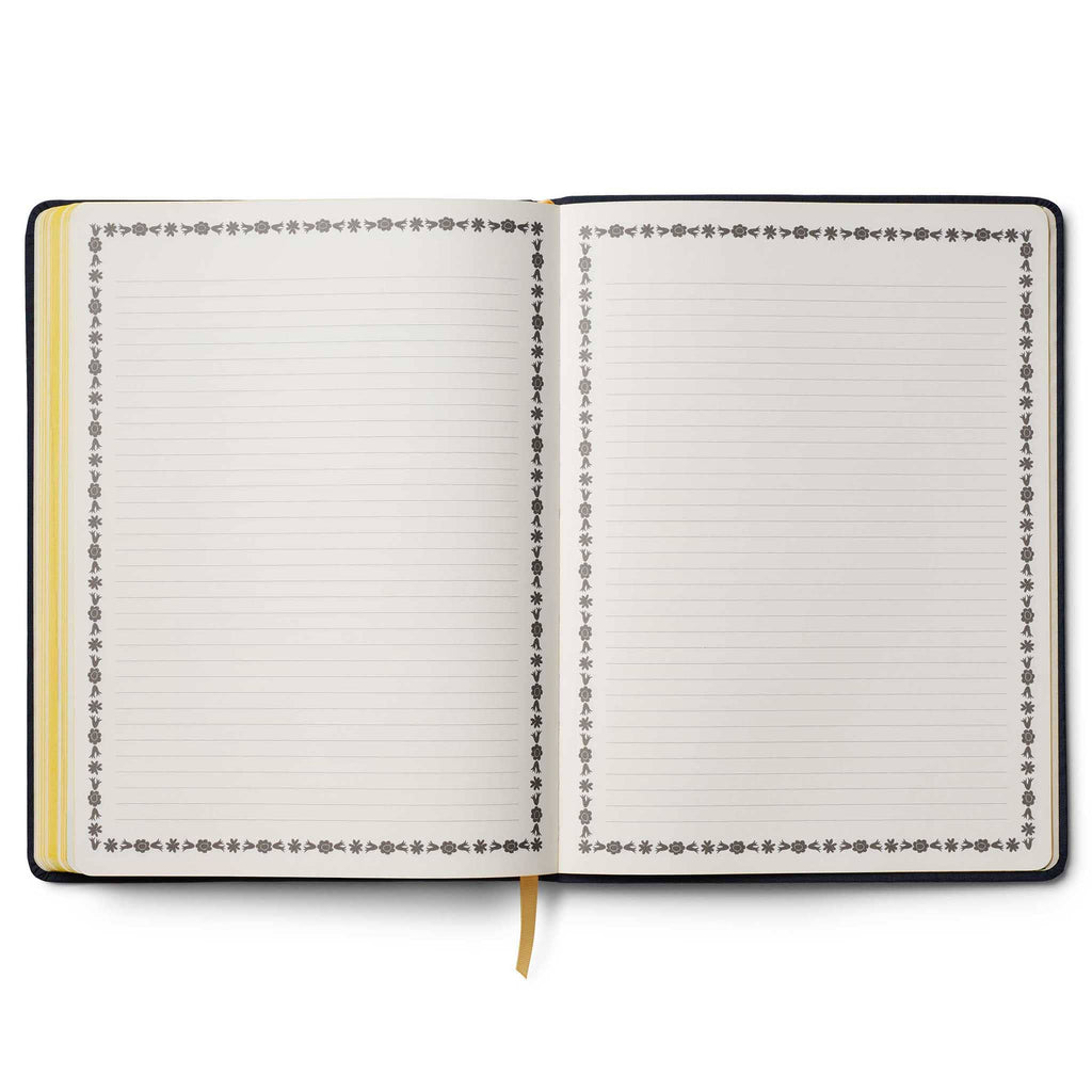 Rifle Paper Co. Wildwood 2026 12-month floral embroidered book bound planner, ruled notes pages, on a white background.