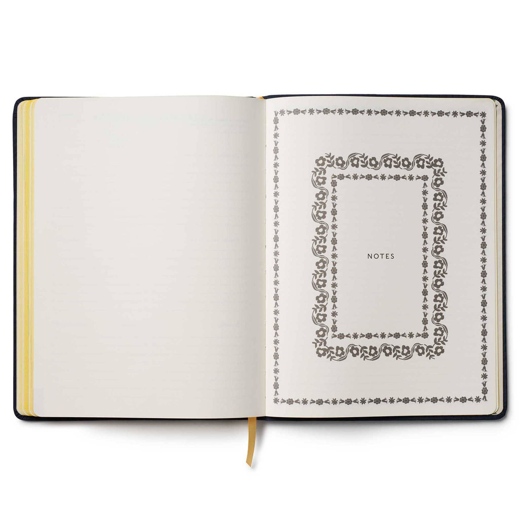 Rifle Paper Co. Wildwood 2026 12-month floral embroidered book bound planner, notes section opener, on a white background.