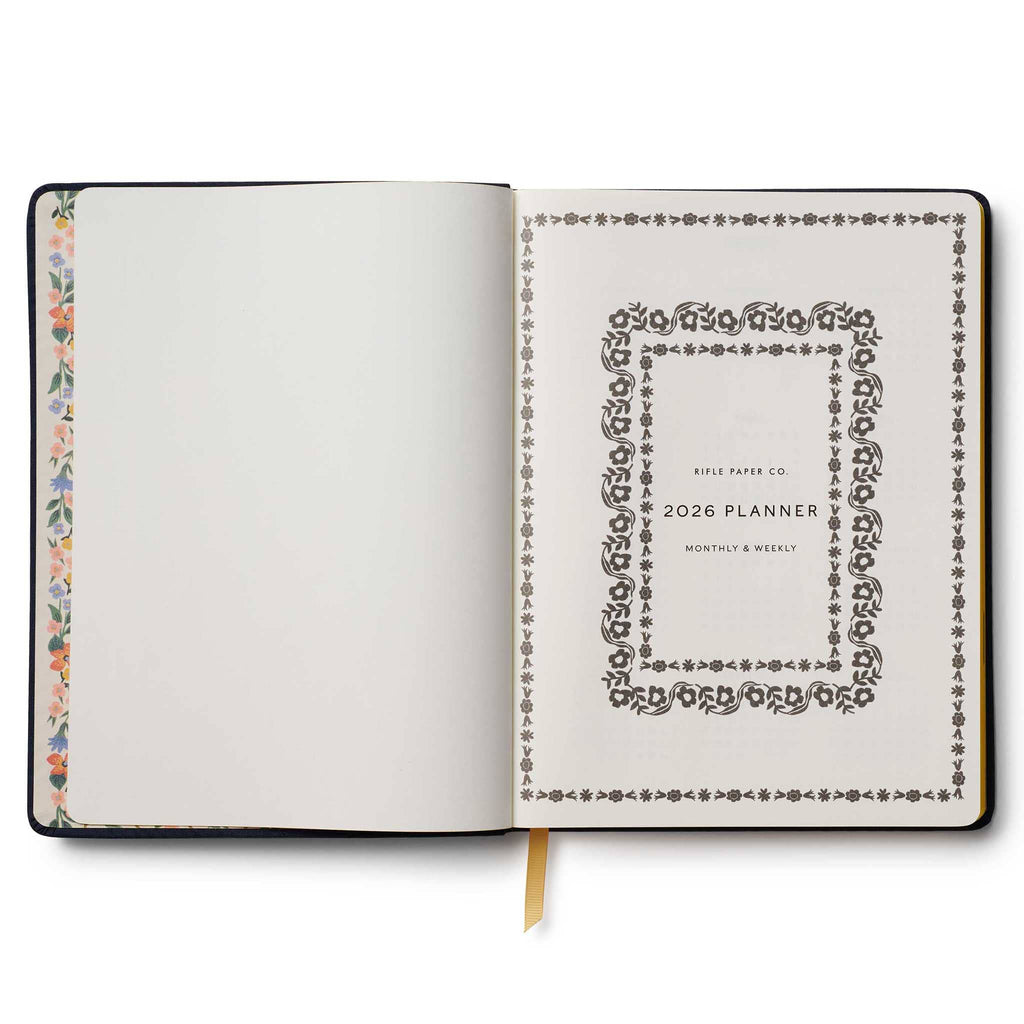 Rifle Paper Co. Wildwood 2026 12-month floral embroidered book bound planner, title page, on a white background.