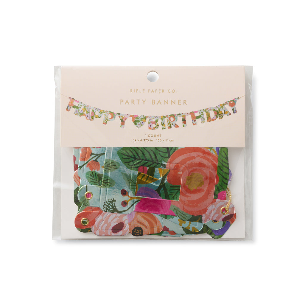 Rifle Paper Co. Garden Party floral print "Happy Birthday" banner, with heart in the middle, in packaging.