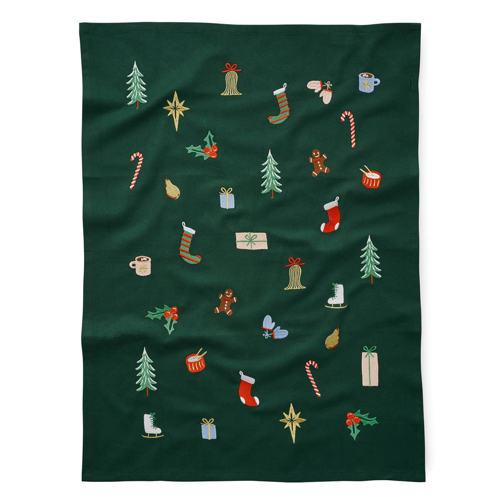 Dark green tea towel with embroidered Christmas-themed patterns on a white background.