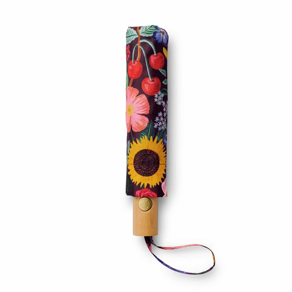 Rifle Paper Co. Blossom colorful floral print on black background automatic umbrella with wood handle, in matching sleeve.