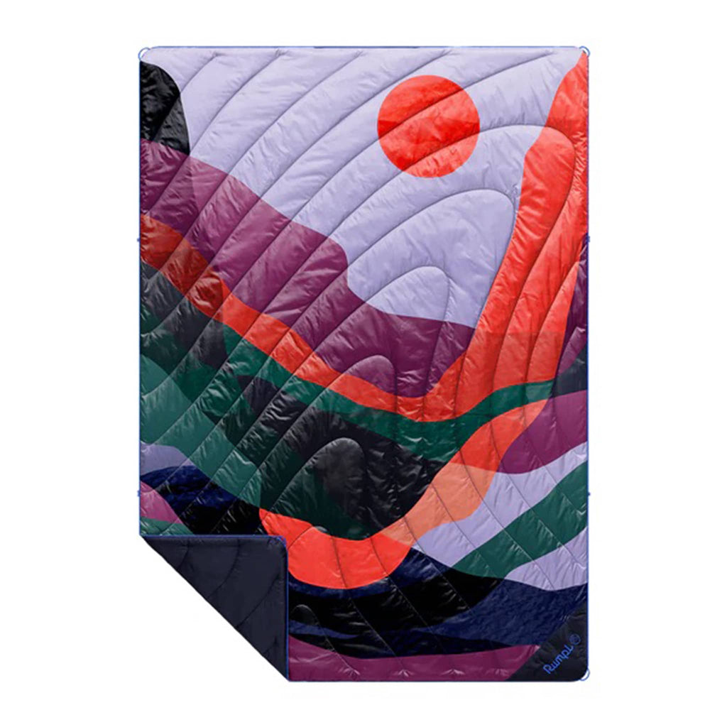 Rumpl Valley Dusk original puffy blanket with an abstract colorful design, flat with corner folded back, on a white background.