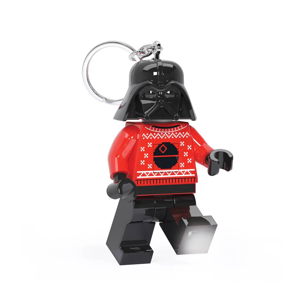 Darth Vader keychain with ugly red sweater on and light in its foot.