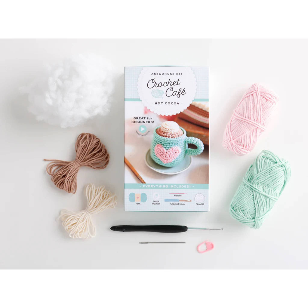 Crochet Cafe Hot Cocoa Amigurumi Kit contents with box packaging, on a white background.
