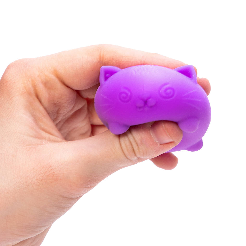 Schylling Teenie NeeDoh cool cats stress relieving fidget toy, being squeezed in fingers to show scale.