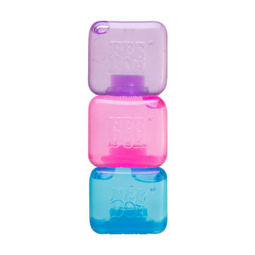 Schylling NeeDoh Nice Ice Baby mini Nice Cube squishy toy in purple, pink and blue, stacked.