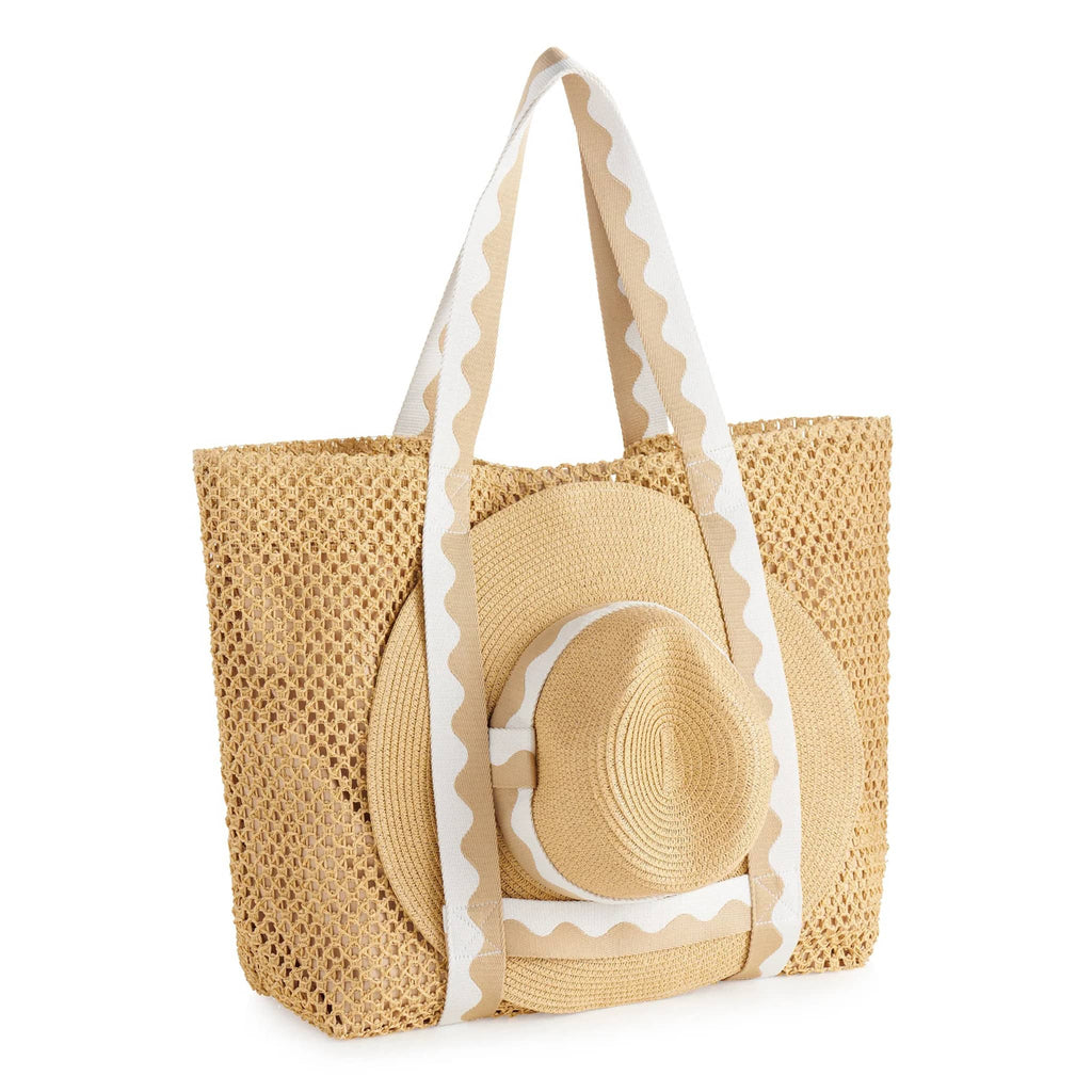 Shiraleah Antigua Tote and Hat set in sand and white, hat nestled in straps, front angle.