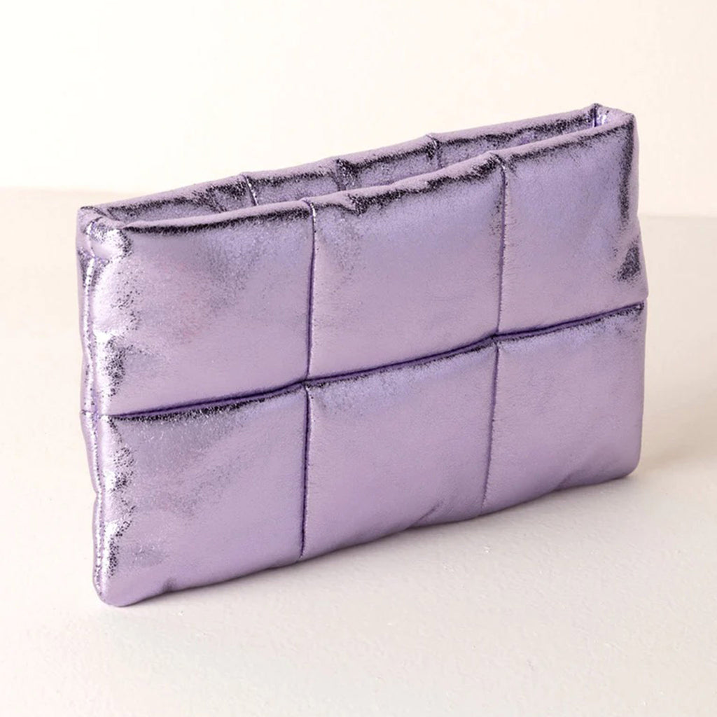 Shiraleah Skyler puffy quilted metallic lilac faux leather pouch with top zip, front and side angle.