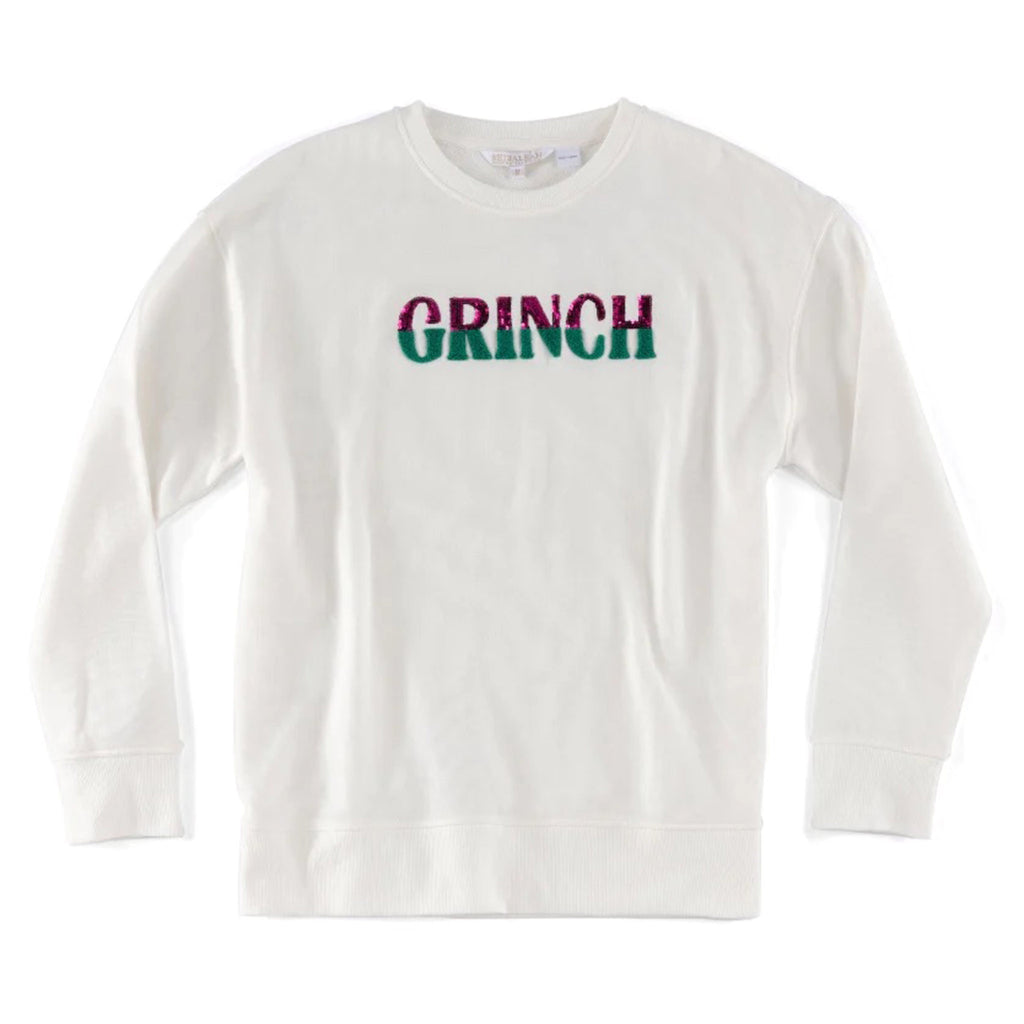 Shiraleah white sweatshirt with classic round neck and banded cuffs and hem and "GRINCH" in bright pink sequin and green sherpa bold lettering.