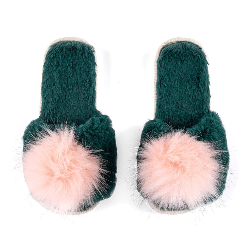 Shiraleah Amor Holiday Slippers, dark green plush slides with fuzzy pale pink pompom on top band.