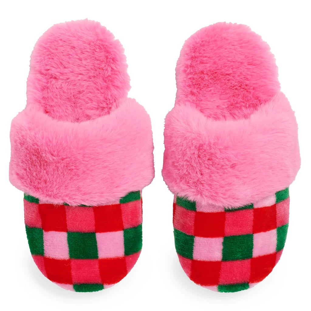 Pair of pink fuzzy slippers with pink, red and green checkered front, on a white background.