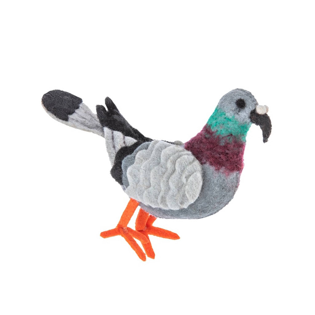 Silk Road Bazaar pigeon felt stitched holiday ornament hanging on tree branch.