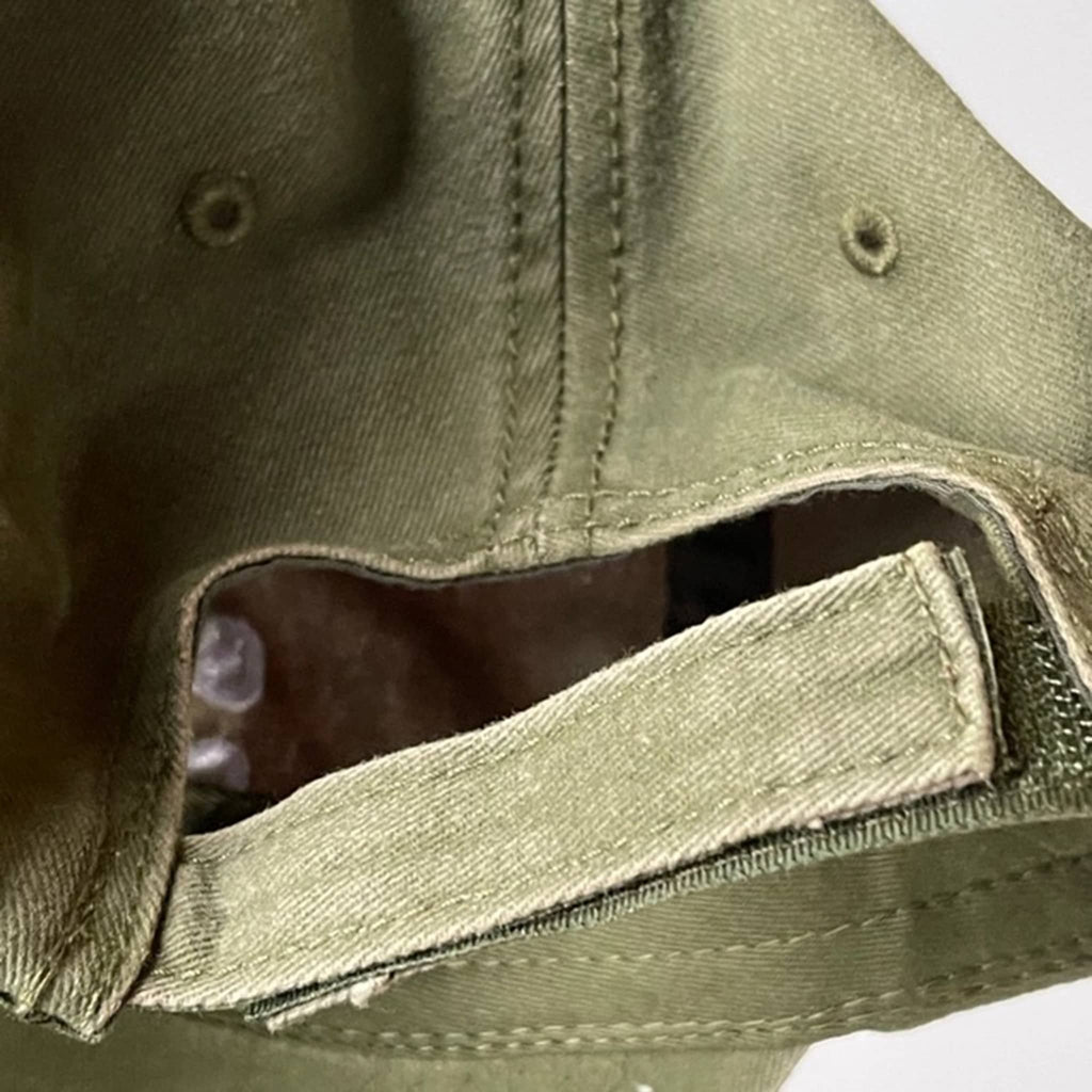 Olive green cap back view showing hook and loop adjustable back, on a white background.