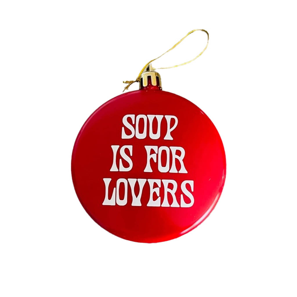 The Silver Spider Soup is For Lovers red glass disc-shaped holiday ornament.