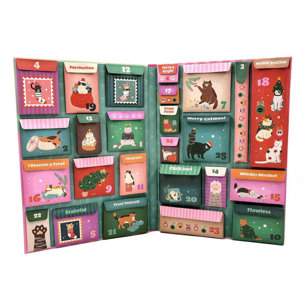 Colorful advent calendar with cat-themed compartments on a white background.