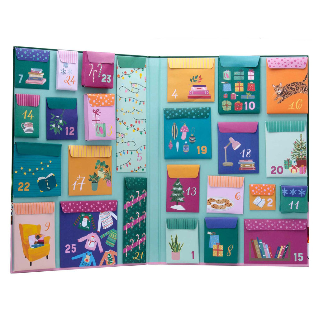 Simon & Schuster The Book Lover's Holiday Advent Calendar, open to show inside and the colorful, illustrated, numbered envelopes.