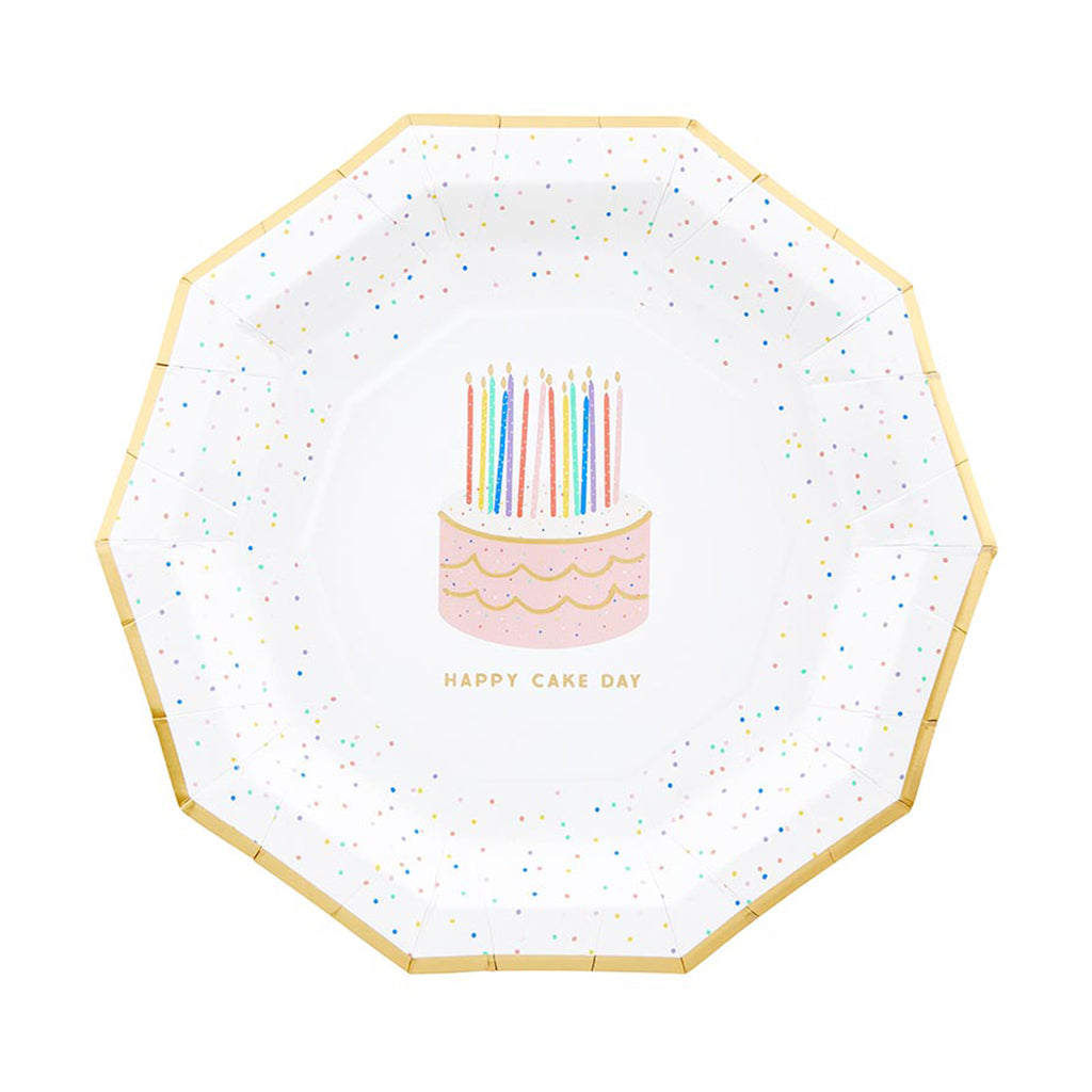 Slant Collections decagon shaped paper party plate with "Happy Cake Day" in gold lettering.