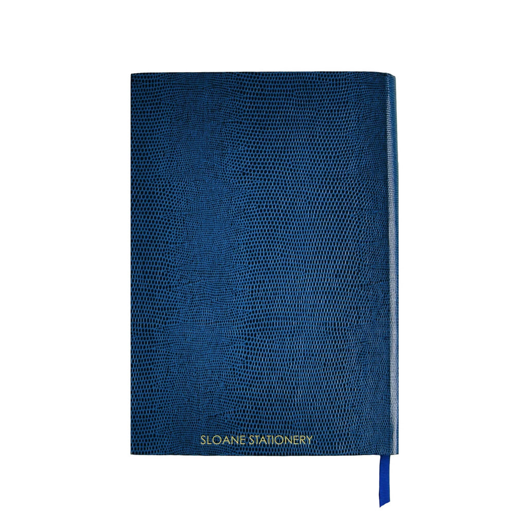 Front cover of a blue faux lizard notebook with "Sloane Stationery" in gold foil, on a white background.