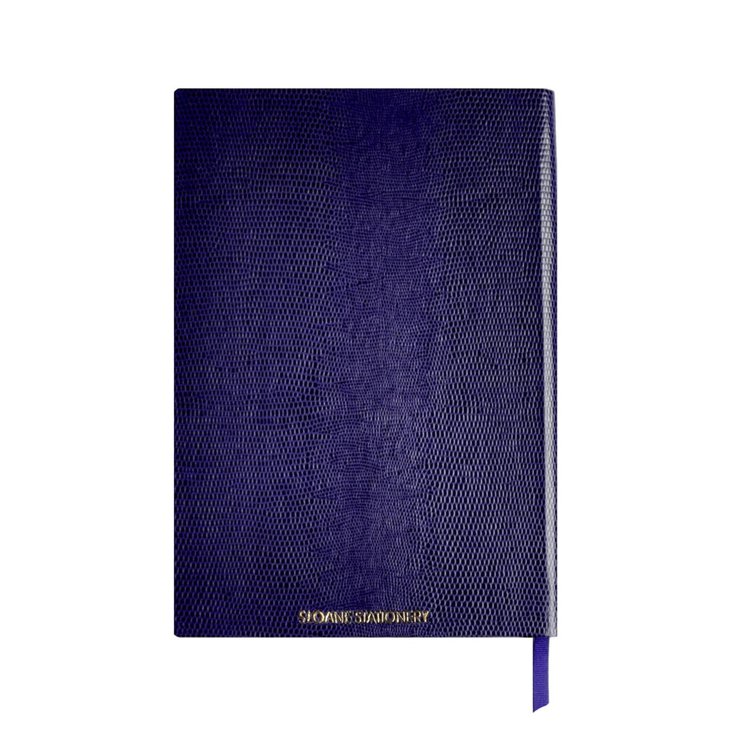 Back of a dark purple faux lizard skin notebook with "Sloane Stationery" text in gold foil, on a white background.