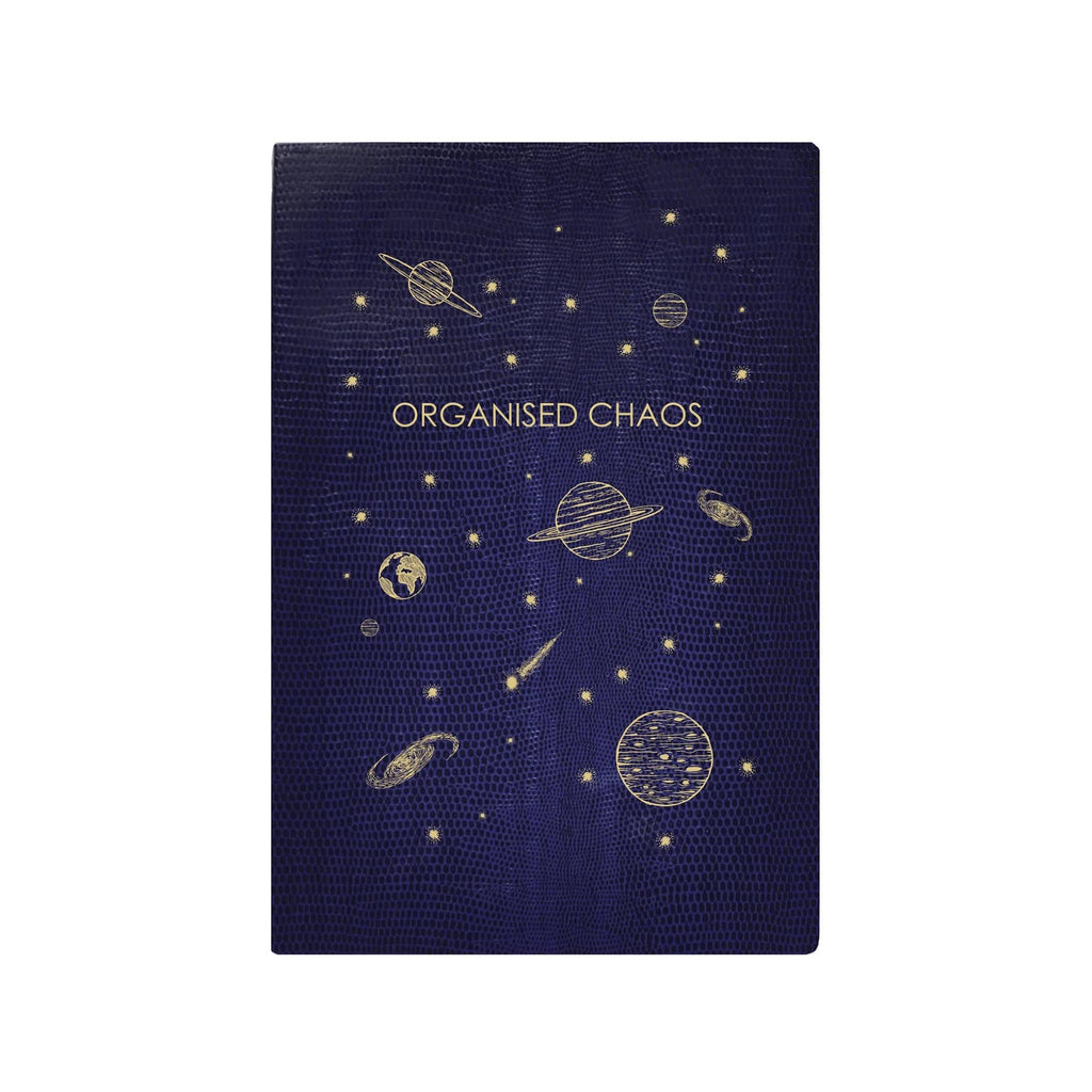 Dark purple faux lizard skin notebook with celestial designs and 'Organised Chaos' text in gold foil, on a white background.