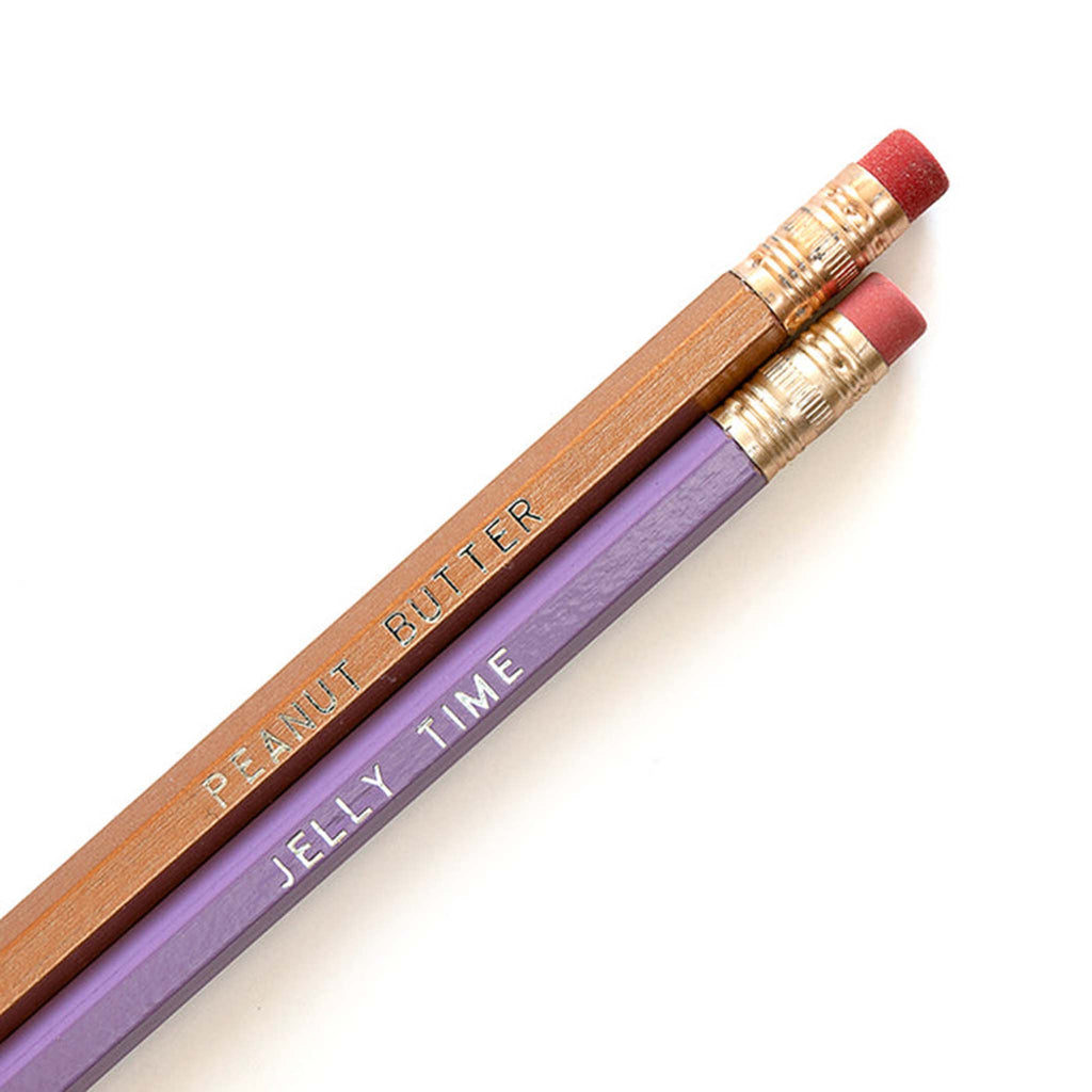 Smarty Pants Paper Co. #2 graphite pencils, set of 2 with gbrown and purple barrel and "peanut butter" and "jelly time" in silver lettering on each, detail.