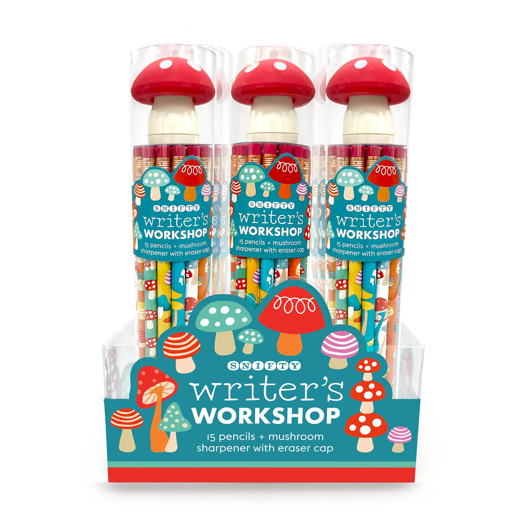 Three packages of 'Writer's Workshop' mushroom-themed pencil, sharpener and eraser sets in a display, on a white background.
