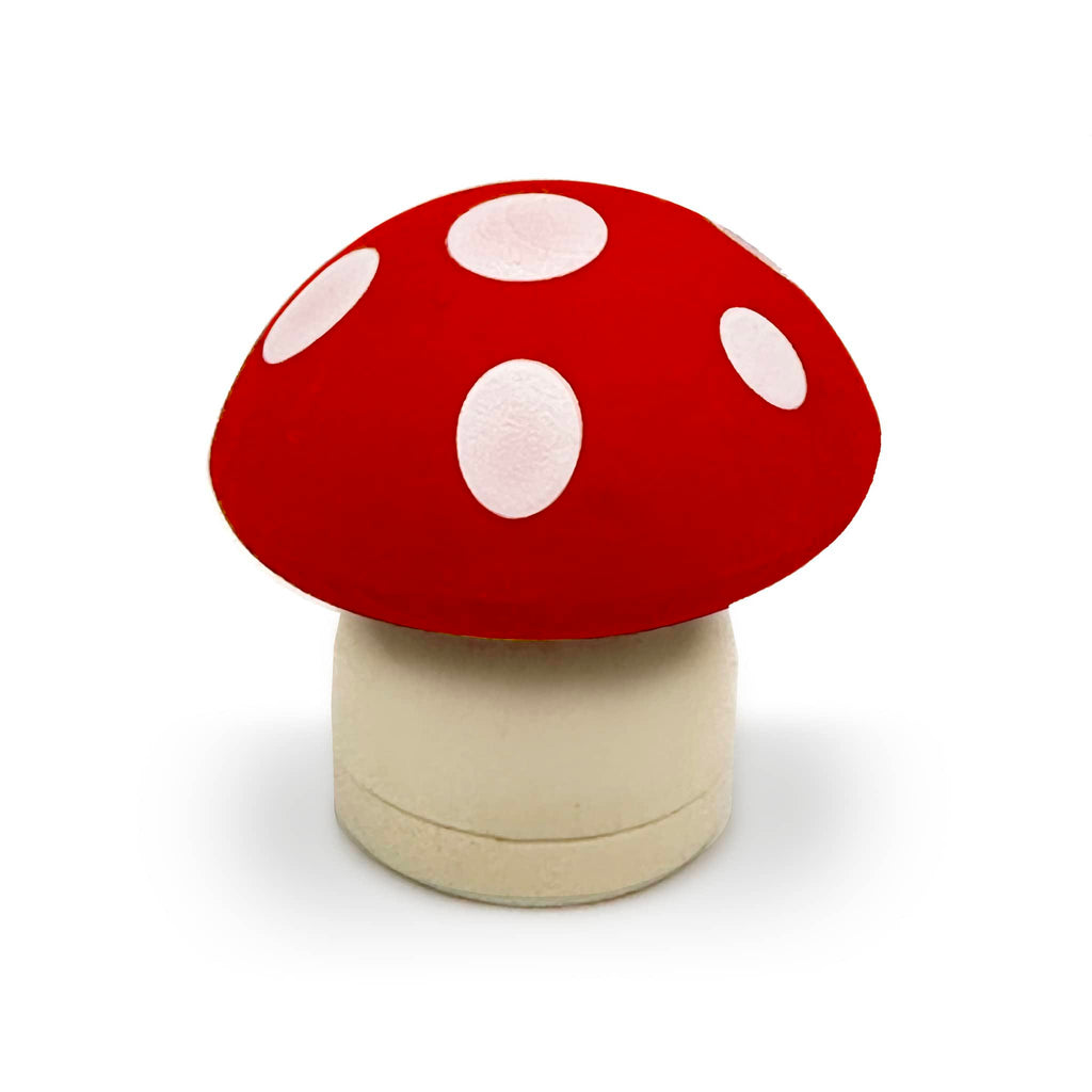 Mushroom Magic pencil sharpener and eraser on white background.