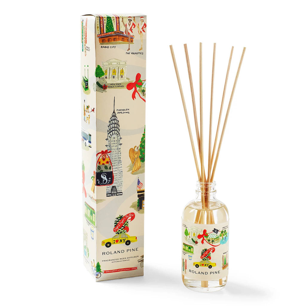 Roland Pine scented diffuser bottle and packaging with NYC holiday illustrations on a white background.