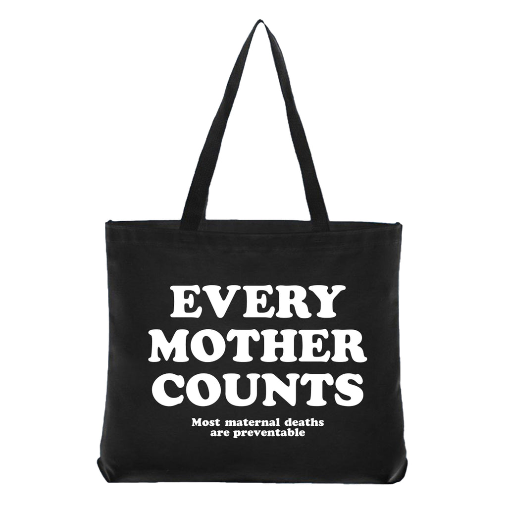 Social Goods x Sarah Clary black canvas tote bag, back view with "Every Mother Counts: more maternal deaths are preventable" in white lettering.