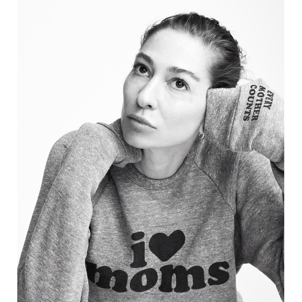 Social Goods x Sarah Clary for Every Mother Counts I love moms heather gray sweatshirt, being worn by Sarah.