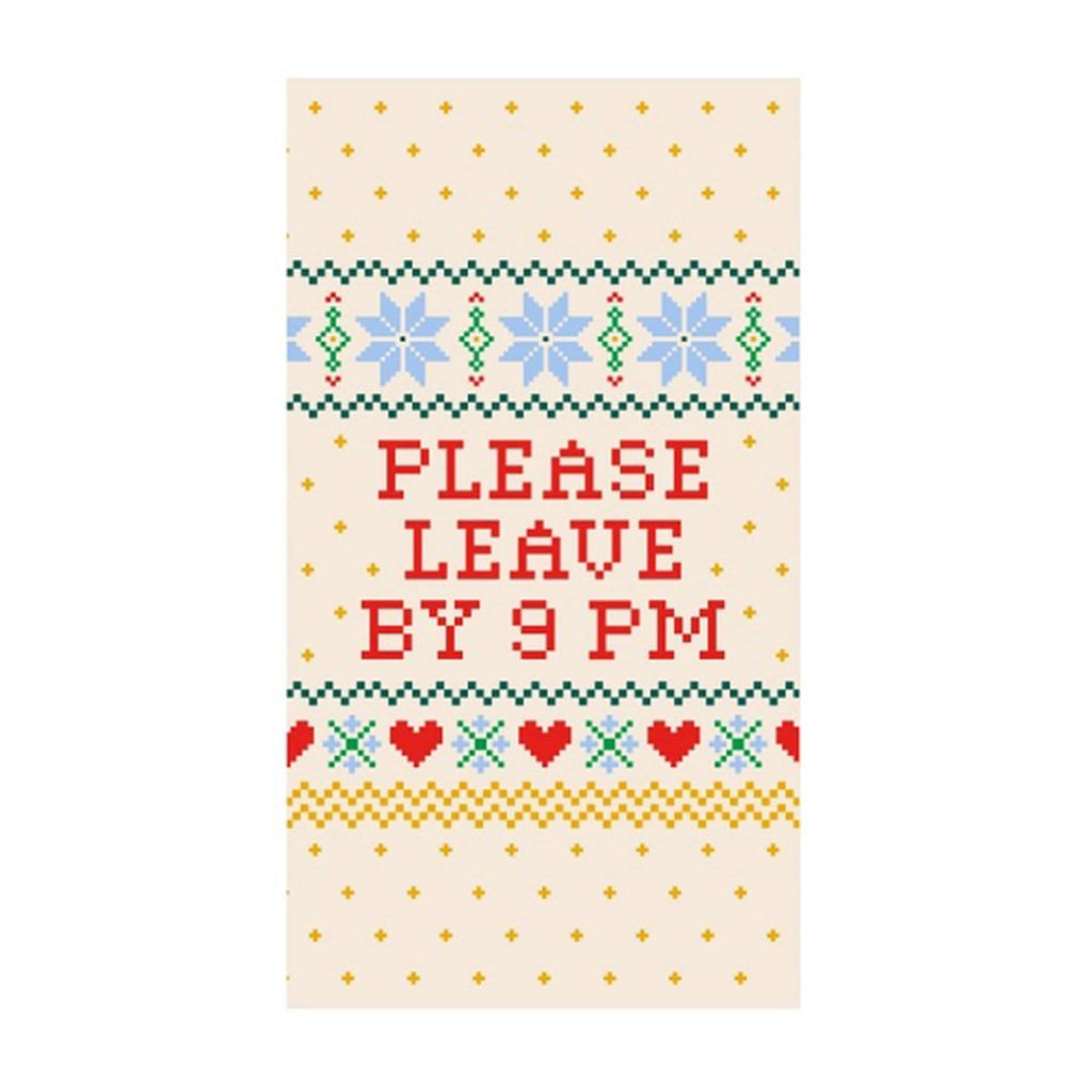 Ivory guest towel with fair isle pattern and "please leave by 9 pm" in red lettering, on a white background.