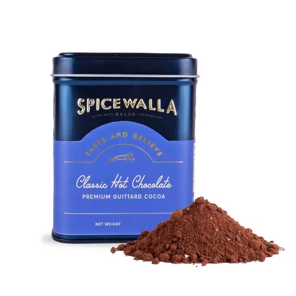 Spicewalla Classic Hot Chocolate in navy tin with small spill in front on a white background.