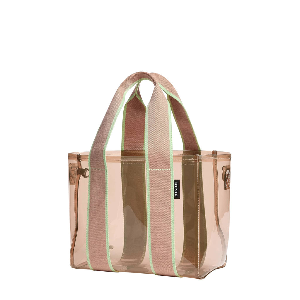 State Bags Mini Wellington Cabana Tote in Latte vinyl bag with matching webbed handles with sage green trim, front angle view. 