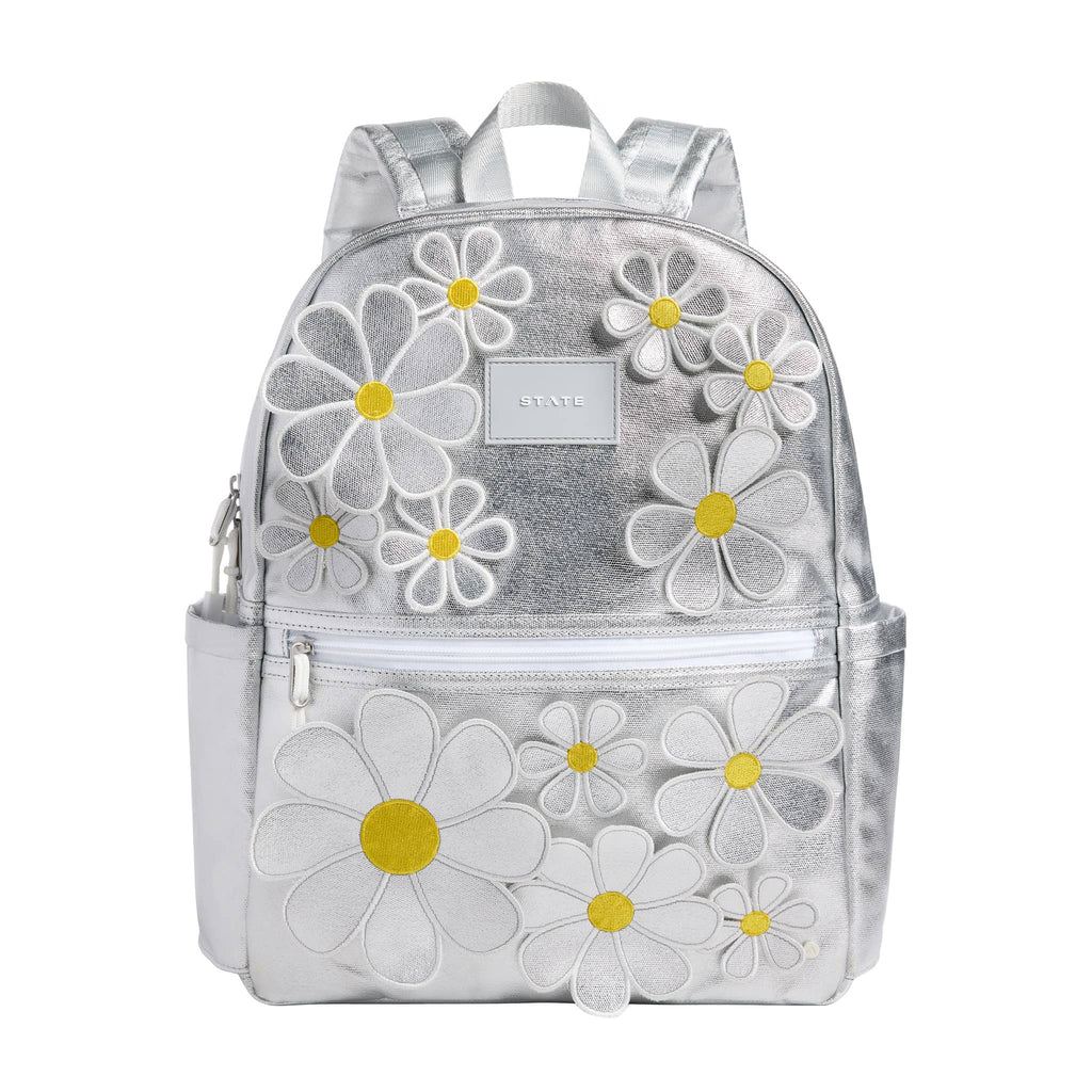 State Bags Kane Kids Travel Backpack in metallic silver 3D floral daisies, front view.