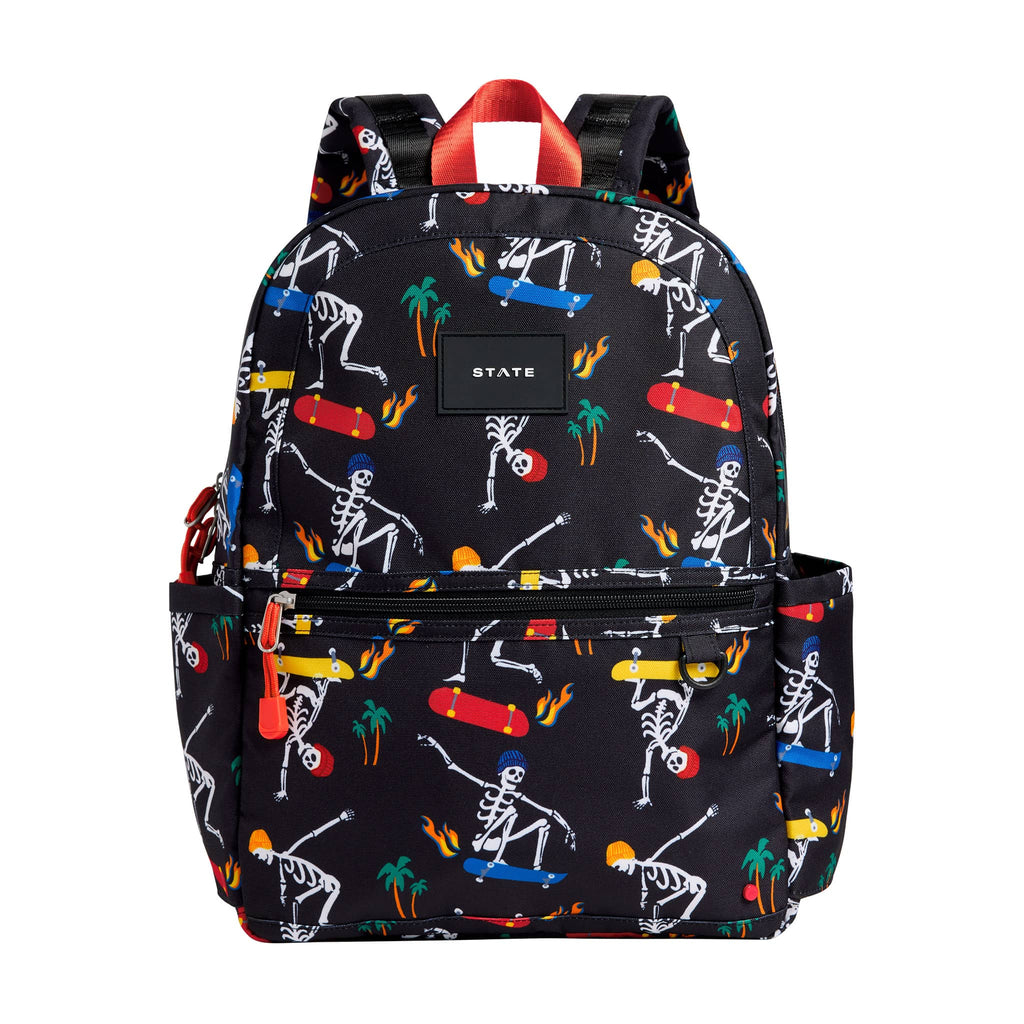 State Bags Kane Kids Double Pocket Backpack in Skeleton Skate, front view.