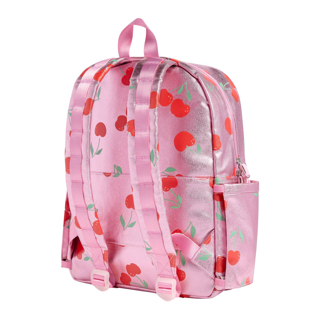 State Bags Kane Kids Travel Backpack in metallic pink Cherries, back angle view.