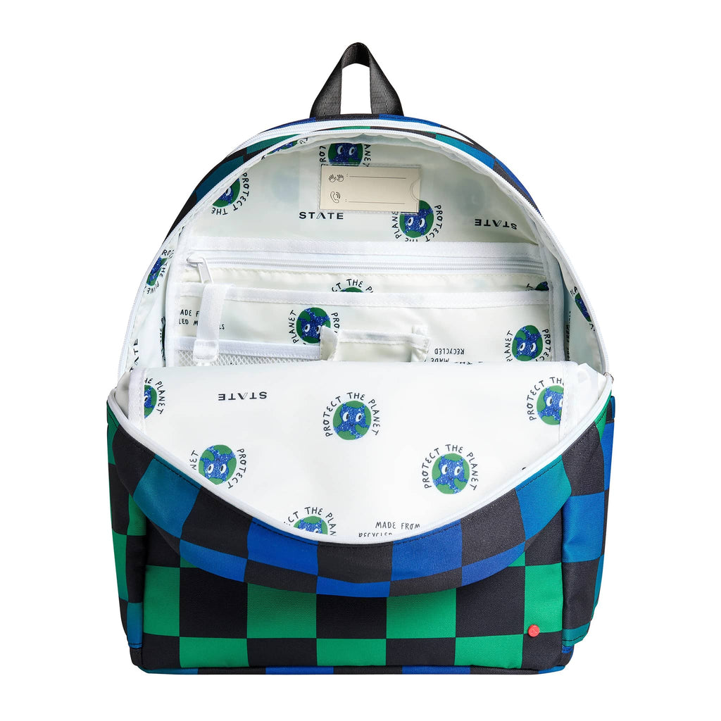 State Bags Kane Kids Double Pocket Backpack, front view with first compartment unzipped to show interior pockets.