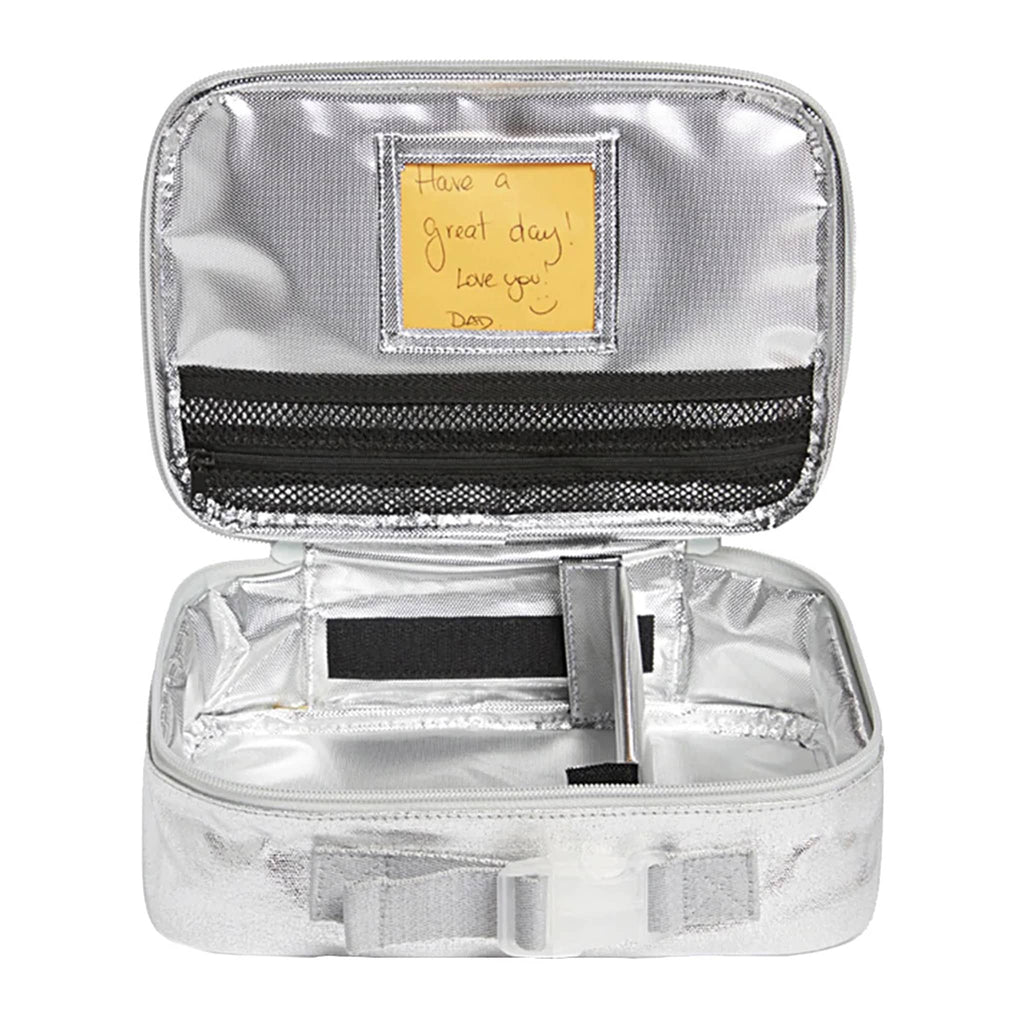 State Bags Rodgers Metallic Silver insulated lunch box, lid open showing interior with note.