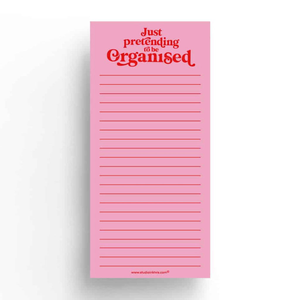 Studio Inktvis To Do List Block Notepad with "Just pretending to be organized" in red serif lettering at the top and red lines on a bright pink background.