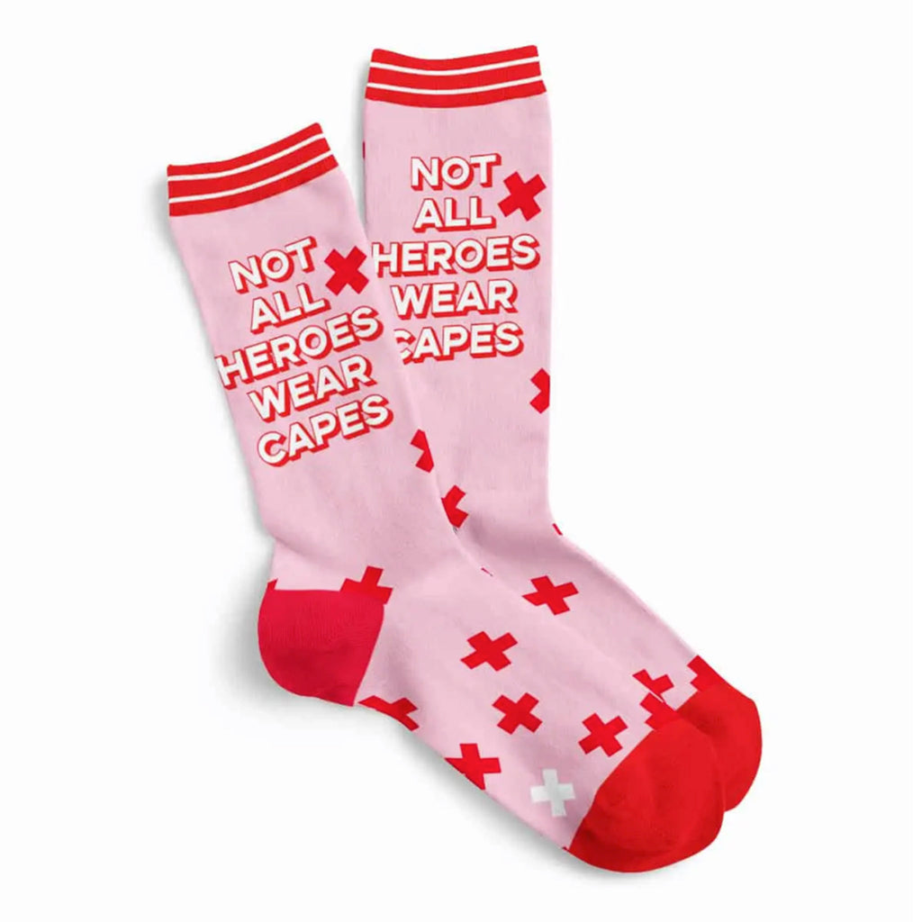 Studio Inktvis pink socks with "not all heroes wear capes" in red & white lettering with a red toe and heel and embellishments.