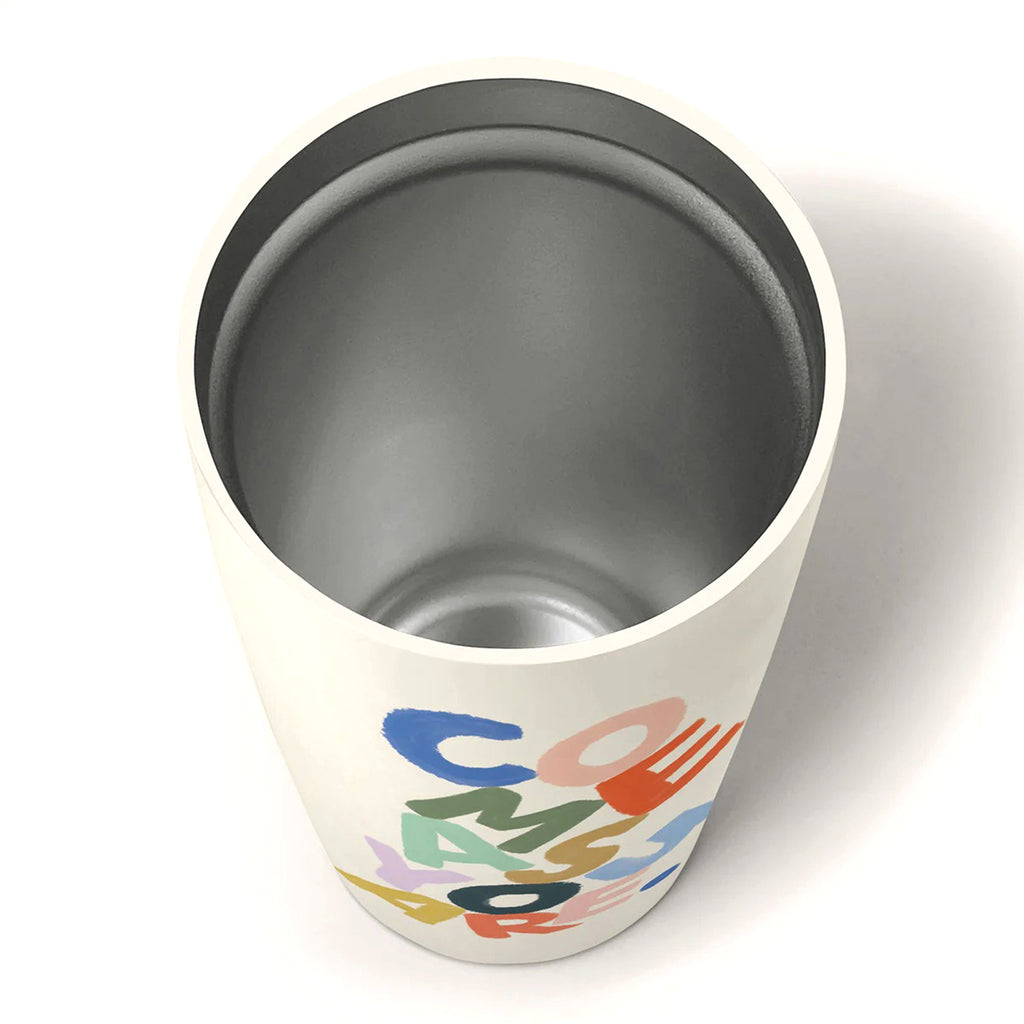 Studio Oh! 17 ounce stainless steel insulated off-white tumbler with "come as you are" in colorful, jumbled letters on the front. Overhead view showing the inside of the tumbler.