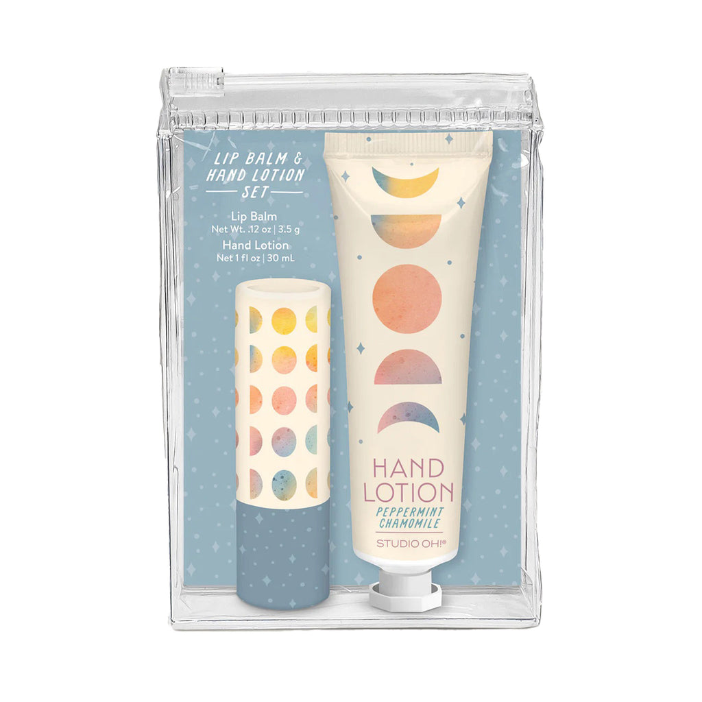Studio Oh! Moon Phases unscented lip balm and peppermint chamomile lightly scented hand lotion in clear plastic pouch with slide zip closure.