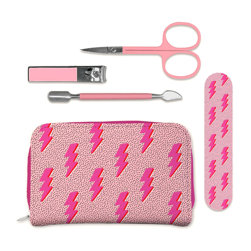 Studio Oh! Charged Up Manicure Set, travel case and emery board have a fuchsia lightning bolt pattern on a speckled pink background and the nail clipper, cuticle pusher and scissors have pink accents.