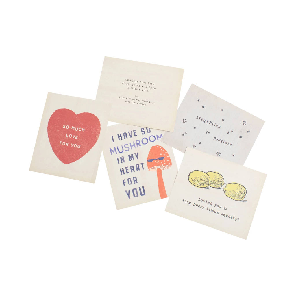Set of four small cards with humorous and affectionate text on a white background.
