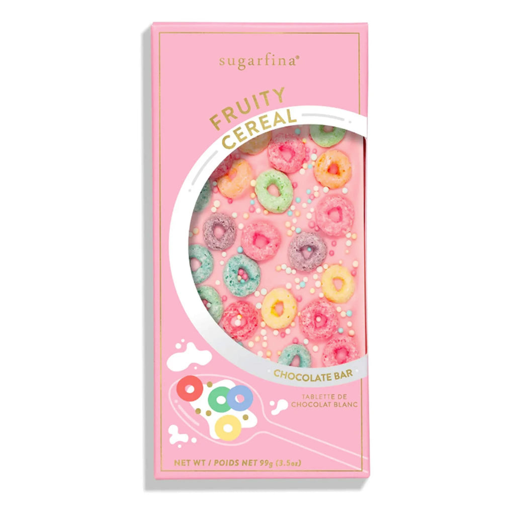 Sugarfina fruity cereal pink tinted white chocolate bar with fruity cereal pieces and sprinkles in pink box packaging, front view.