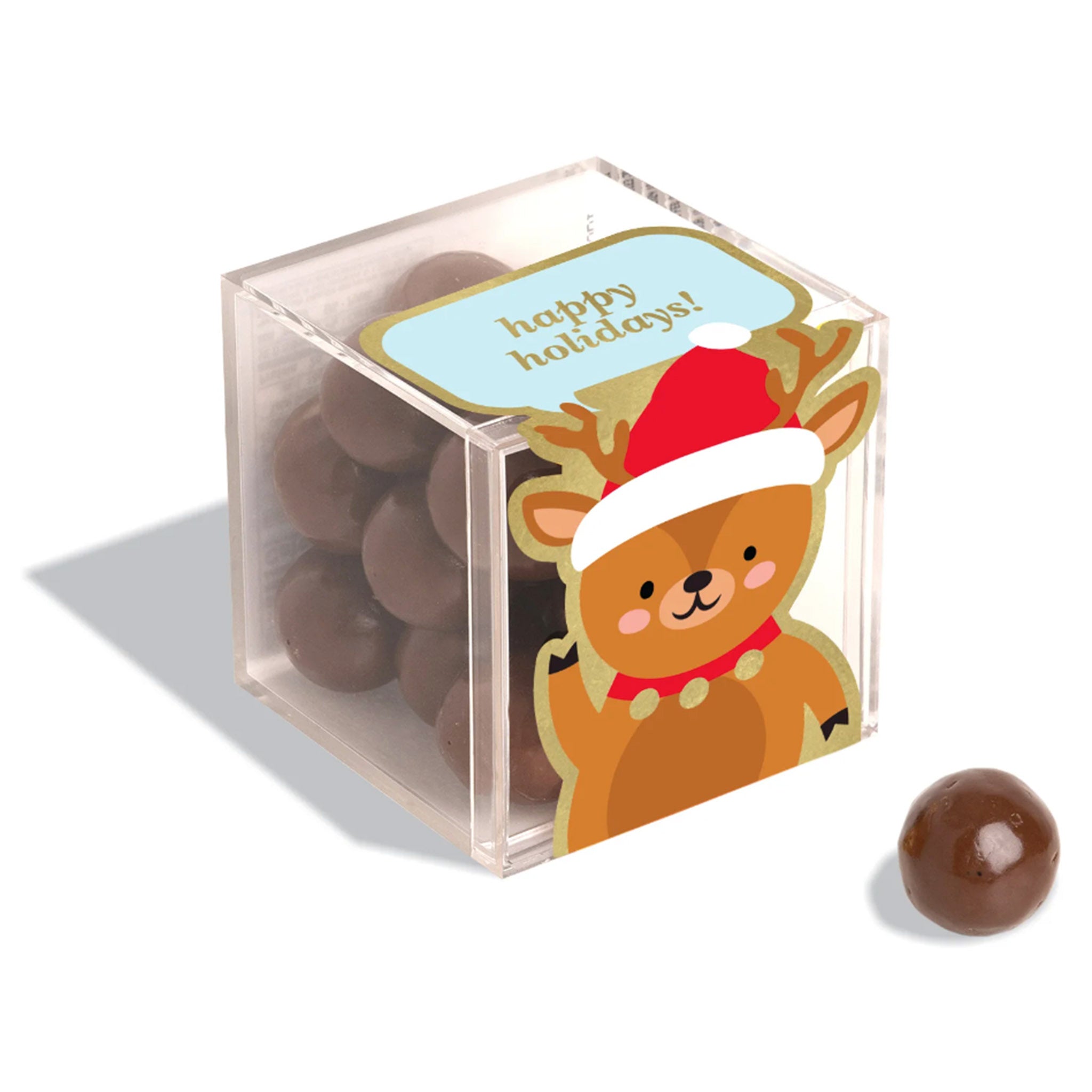 https://blueribbongeneralstore.com/cdn/shop/files/sugarfina-K2949-reindeer-sparkle-pops-milk-chocolate-holiday-christmas-candy-in-clear-small-candy-cube-angle.jpg?v=1698961678