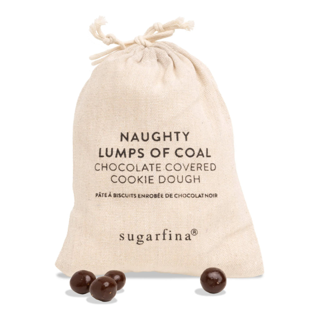 Sugarfina Lumps of Coal Chocolate Covered Cookie Dough candy in inner off-white drawstring bag with a few round dark chocolate balls in front.
