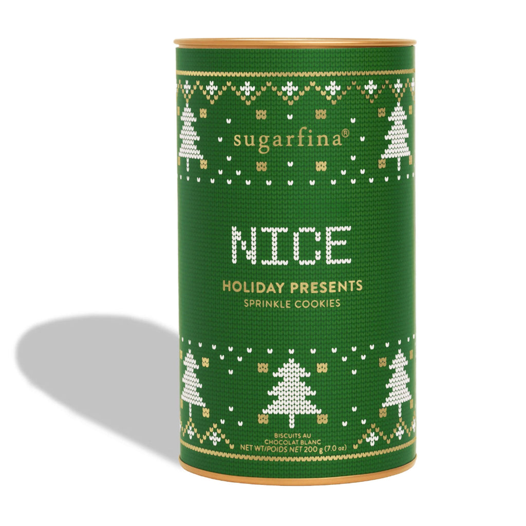 Sugarfina Holiday Presents Sprinkle Cookies candy in green canister with a tree pattern border that looks like embroidery and "Nice" on the front.
